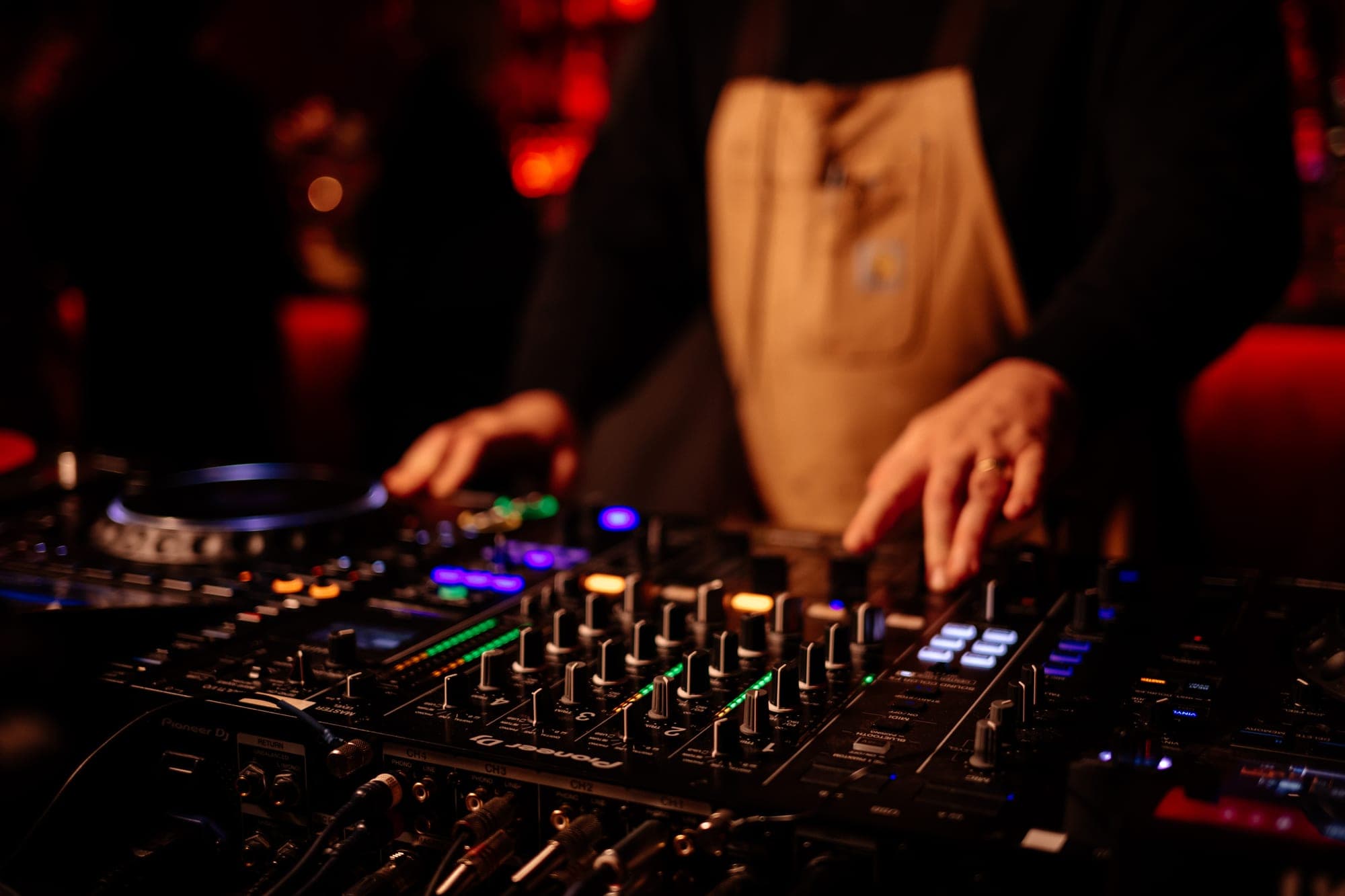 dj mixer with dj playing